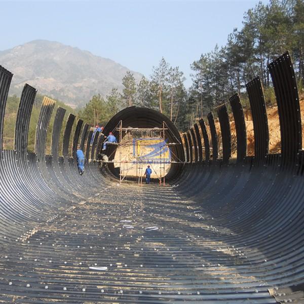 hot galvanzied corrugated steel pipe used as culvert , small bridge